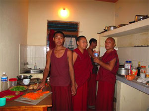 monk prepares food in kitchen, Tsawa Khamtsen